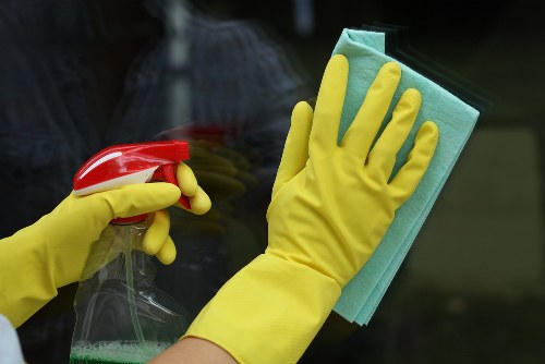 Office cleaner working in a central London workplace in SW1