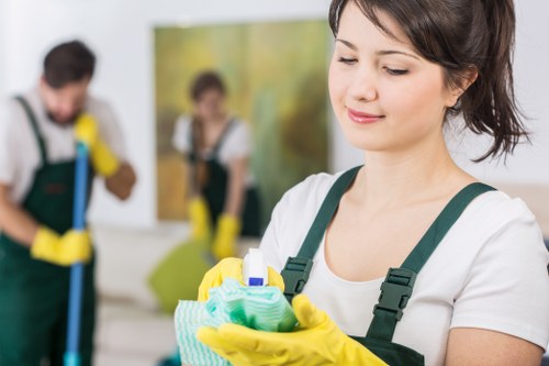 Professional carpet cleaner inspecting a room for safety